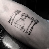 Simple black ink kitchen devices tattoo on forearm
