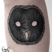 Simple black ink leg tattoo of owl shaped mask