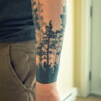 Simple black ink mystical dark forest forearm tattoo