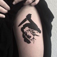 Simple black ink shoulder tattoo of creepy woman with knife