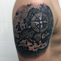 Simple colored big world map tattoo on shoulder