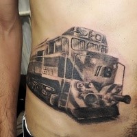Simple designed black and white cargo train tattoo on belly