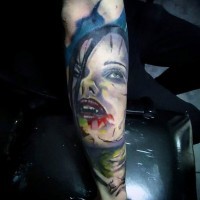 Simple designed colored bloody vampire woman tattoo on arm