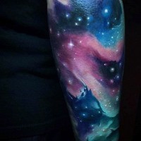 Simple designed little colorful space tattoo on wrist