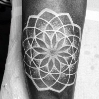 Simple designed white ink flower shaped tattoo on arm