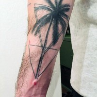 Simple geometrical style colored palm tree with triangles tattoo on arm