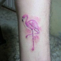 Simple homemade like tiny pink flamingo tattoo on leg