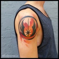 Simple homemade like watercolor painted Jedi symbol tattoo on shoulder