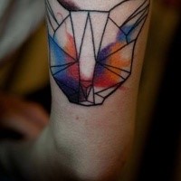 Simple homemade style colored arm tattoo of cat head