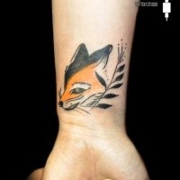 Simple homemade style colored wrist tattoo of big fox head with plant branch