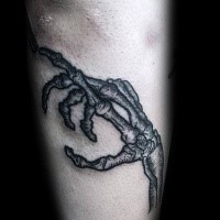Simple homemade style detailed arm tattoo of bone hand