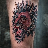 Simple illustrative style thigh tattoo of roaring lion