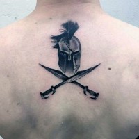 Simple little black ink Spartan helmet and crossed swords tattoo with lettering on upper back
