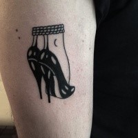 Simple old school style black ink tattoo of woman legs with rope
