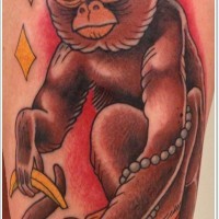 Simple old school style colored monkey with clock tattoo on thigh