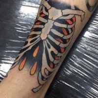 Einfacher Oldschool Stil gemaltes und farbiges Skelett Tattoo am Bein