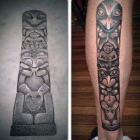 Simple old school style painted black ink tribal statue tattoo on leg