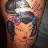 Simple painted homemade colored arm tattoo of geisha portrait