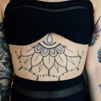 Simple painted little black ink flower tattoo on belly