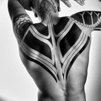 Simple painted massive black ink tribal ornaments tattoo on sleeve and upper back