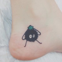 Simple tiny colored cartoon monster with star tattoo on foot