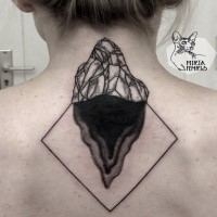 Simple unfinished black ink back tattoo of small rock