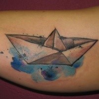 Simple watercolor style arm tattoo of paper ship