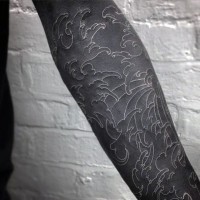 Simple white ink clouds tattoo on arm