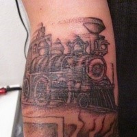 Sketch style black ink arm tattoo of steam train