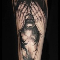 Sketch style black ink forearm tattoo of sad woman