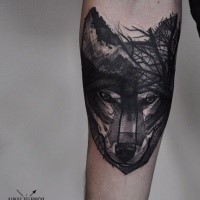Sketch style black ink forearm tattoo of wolf head