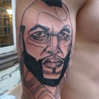 Sketch style black ink shoulder tattoo of famous actor face