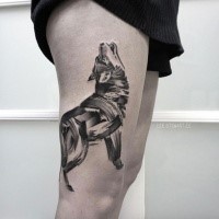 Sketch style black ink thigh tattoo of typical wolf