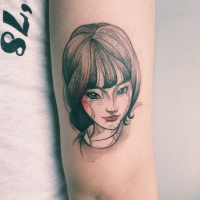 Sketch style colored arm tattoo of beautiful woman face