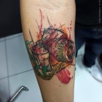 Sketch style colored forearm tattoo of modern camera