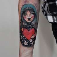 Sketch style colored forearm tattoo of funny doll with heart