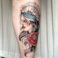 Sketch style colored leg tattoo of nice woman with feather and rose
