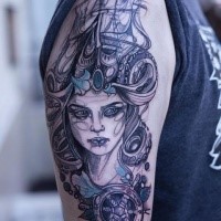 Sketch style colored shoulder tattoo of fantasy woman stylized with sailing ship