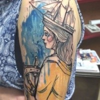 Sketch style colored shoulder tattoo of woman with sailing ship instead of helmet