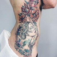 Sketch style colored side tattoo of cute woman with flowers