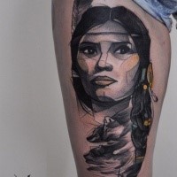 Sketch style colored thigh tattoo of Indian woman combined with little wolves