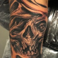 Monster skull in agony tattoo by graynd