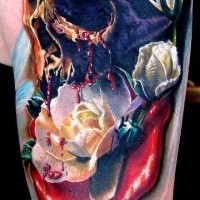 Colourful skull and flowers detailed tattoo