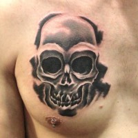 Black skull tattoo on chest