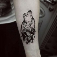 Slim vintage black ink forearm tattoo of corrupting wolf