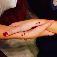 Small birds in friendship tattoos