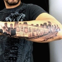 Small black and gray style modern city train tattoo on forearm