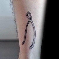 Small black ink arm tattoo of human bone