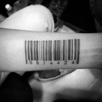 Small black ink forearm tattoo of barcode