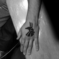 Small black ink hand tattoo of Egypt God